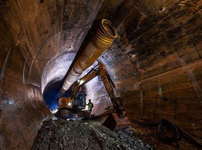 A bulldozer works to maintain Chicago's underground. More frequent and intense storms pose danger to aging infrastructure like these tunnels.